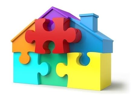 An image of a home built out of puzzle pieces representing the different parts of a mortgage that combine to determine the type of mortgage it is